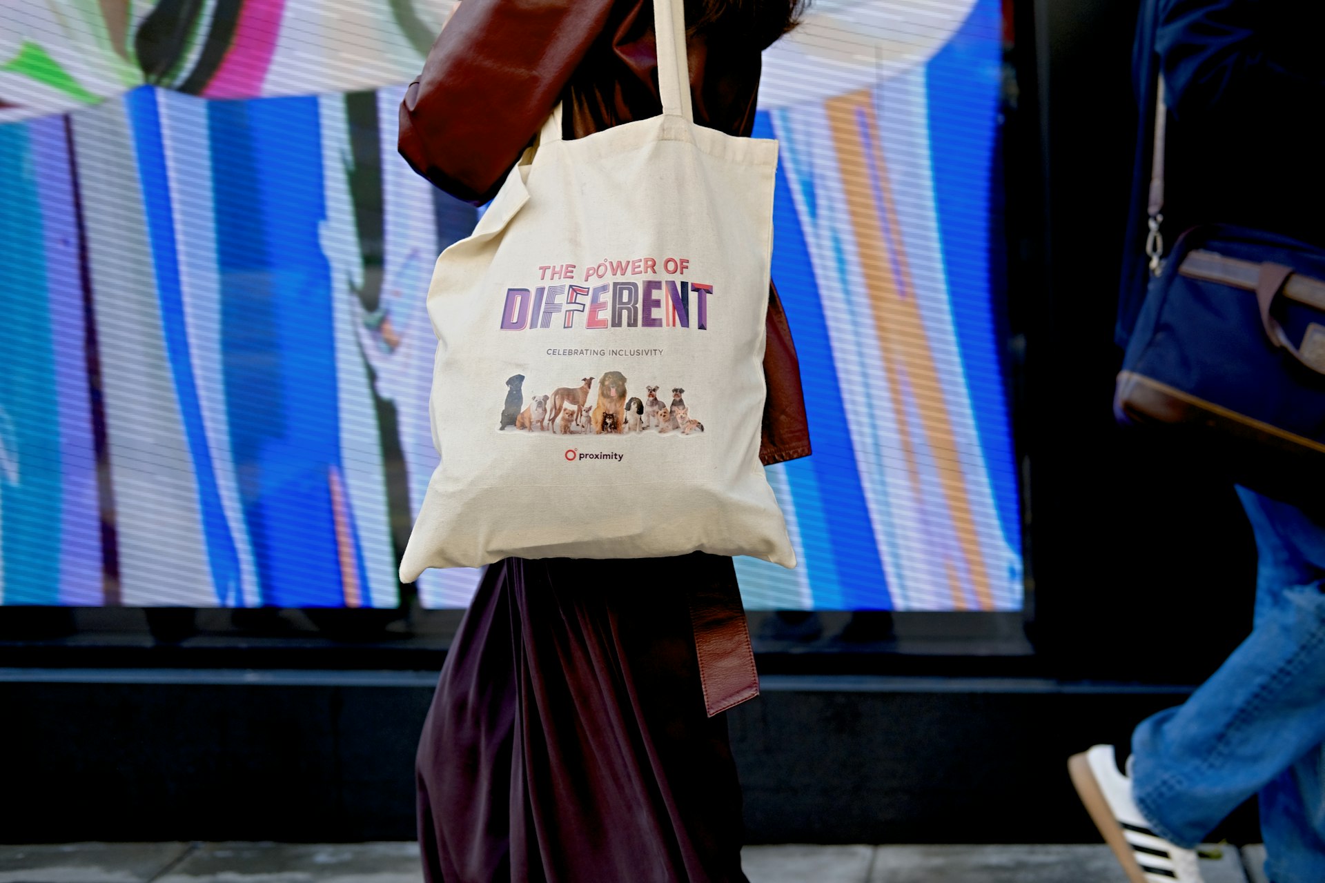 woman holding tote bag